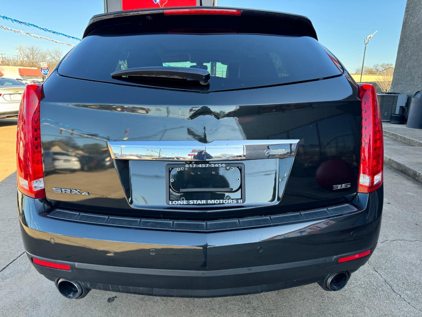 2014 BLACK CADILLAC SRX LUXURY (3GYFNEE31ES) , located at 5900 E. Lancaster Ave., Fort Worth, TX, 76112, (817) 457-5456, 0.000000, 0.000000 - Photo#4